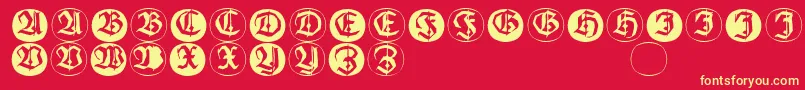 Frakturinitialenangularround-fontti – keltaiset fontit punaisella taustalla