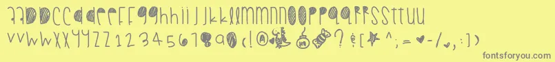 フォントSummerfall – 黄色の背景に灰色の文字