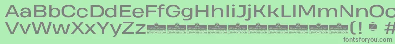 フォントHeadingProWideRegularTrial – 緑の背景に灰色の文字