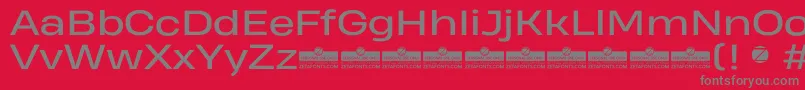 Шрифт HeadingProWideRegularTrial – серые шрифты на красном фоне