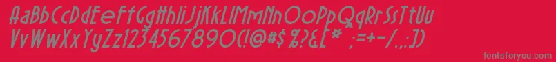 SierraMadreItalic-fontti – harmaat kirjasimet punaisella taustalla