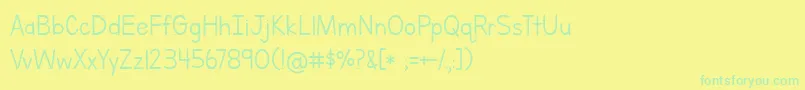 Fonte LettersForLearnersLinedHattedJ – fontes verdes em um fundo amarelo
