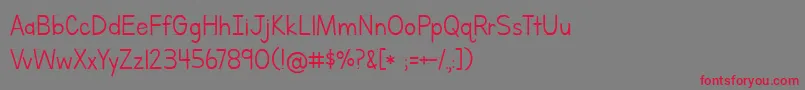 LettersForLearnersLinedHattedJ Font – Red Fonts on Gray Background