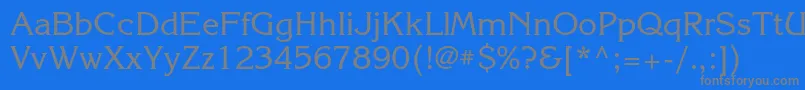 Korinnac-fontti – harmaat kirjasimet sinisellä taustalla