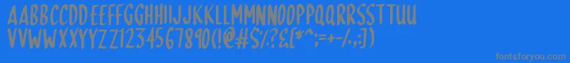 SkinnyDipping Font – Gray Fonts on Blue Background