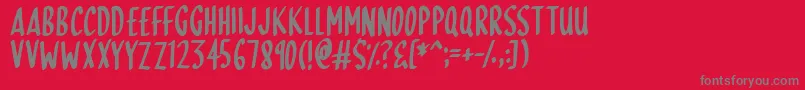 SkinnyDipping Font – Gray Fonts on Red Background