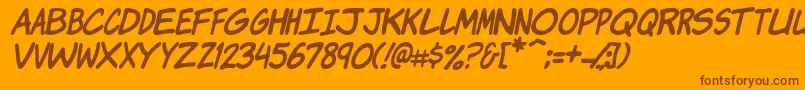 KomikaJamItalic-fontti – ruskeat fontit oranssilla taustalla
