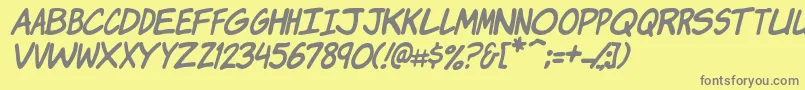 フォントKomikaJamItalic – 黄色の背景に灰色の文字