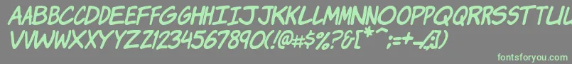 フォントKomikaJamItalic – 灰色の背景に緑のフォント