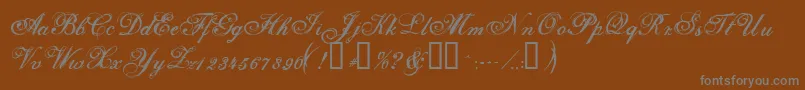 Więcej informacji o czcionce Selfish ffy Czcionka Selfish ffy – szare czcionki na brązowym tle