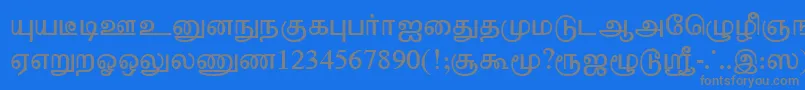 TharminiPlain-fontti – harmaat kirjasimet sinisellä taustalla