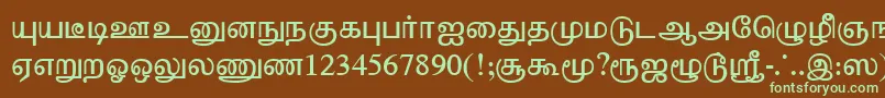 フォントTharminiPlain – 緑色の文字が茶色の背景にあります。