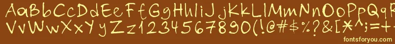 Nihat-fontti – keltaiset fontit ruskealla taustalla