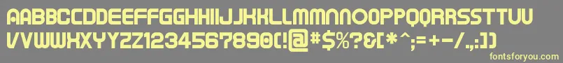 Czcionka Tapeman – żółte czcionki na szarym tle