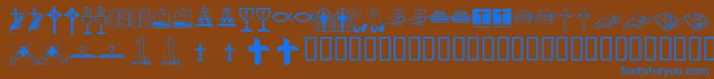 Kr Lyndas Christian Dings Font – Blue Fonts on Brown Background