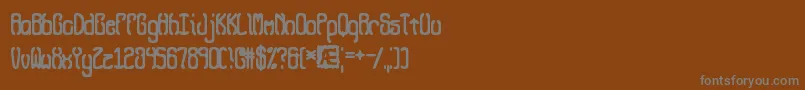 Шрифт QueasyBrk – серые шрифты на коричневом фоне