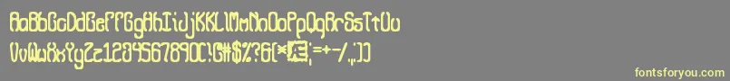 QueasyBrk Font – Yellow Fonts on Gray Background