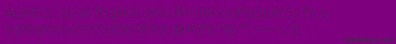 Czcionka RajdhaniLight – czarne czcionki na fioletowym tle