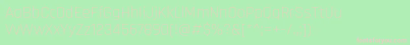 RajdhaniLight-fontti – vaaleanpunaiset fontit vihreällä taustalla
