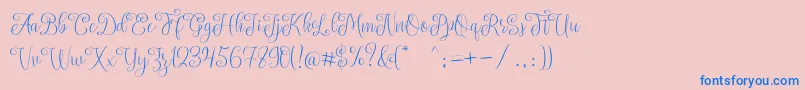 SettaScript Font – Blue Fonts on Pink Background