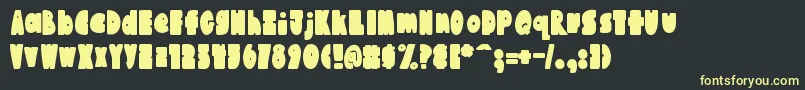 AustieBostChunkiliciousBounce Font – Yellow Fonts on Black Background