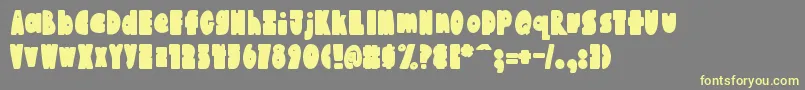 AustieBostChunkiliciousBounce Font – Yellow Fonts on Gray Background