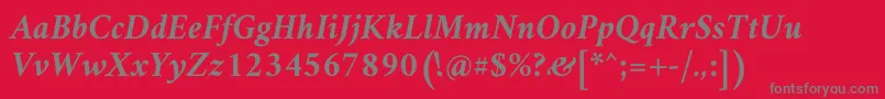 AmiriBoldslanted-fontti – harmaat kirjasimet punaisella taustalla