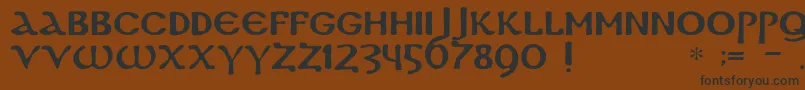 フォントDsCoptic – 黒い文字が茶色の背景にあります