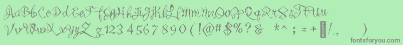 Wickedlittletown Font – Gray Fonts on Green Background