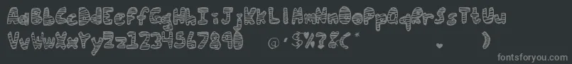 フォントLoveInStripes – 黒い背景に灰色の文字