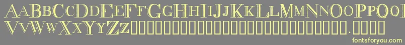 DecadenceCondensed-Schriftart – Gelbe Schriften auf grauem Hintergrund