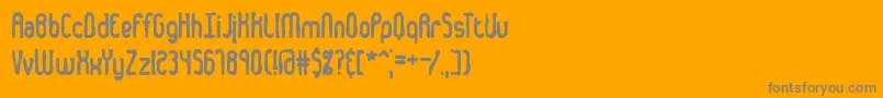 DentedBrk-Schriftart – Graue Schriften auf orangefarbenem Hintergrund