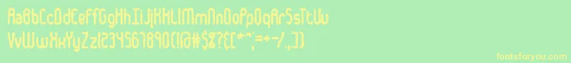 フォントDentedBrk – 黄色の文字が緑の背景にあります