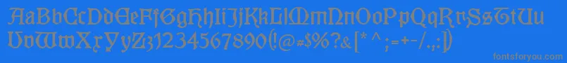 Kuenstlergotisch Font – Gray Fonts on Blue Background