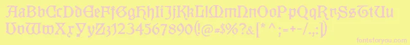 Kuenstlergotisch-fontti – vaaleanpunaiset fontit keltaisella taustalla