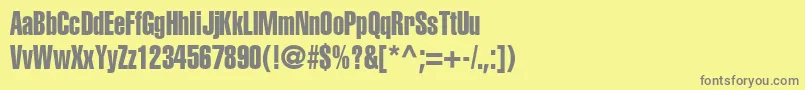 ContextExtraCondensedSsiExtraCondensed-fontti – harmaat kirjasimet keltaisella taustalla