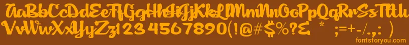 AgnesScript Font – Orange Fonts on Brown Background