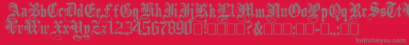 IncisedBlack-Schriftart – Graue Schriften auf rotem Hintergrund