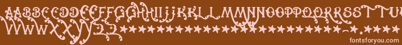 Czcionka Cowboyrhumbahut – różowe czcionki na brązowym tle