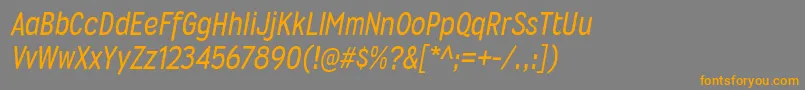 フォントWyvernrgItalic – オレンジの文字は灰色の背景にあります。