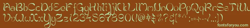 フォントBrahmi – 緑色の文字が茶色の背景にあります。
