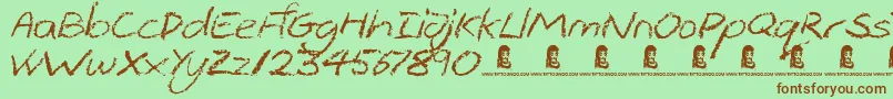 ThePits Font – Brown Fonts on Green Background