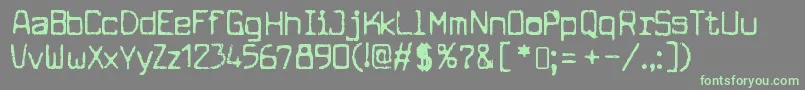 フォントCuomotypeRegular – 灰色の背景に緑のフォント
