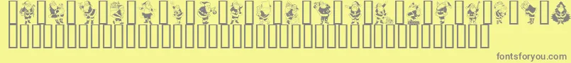 フォントGeSantaClaus – 黄色の背景に灰色の文字