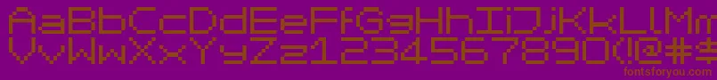 MikrokomputerClosed-fontti – ruskeat fontit violetilla taustalla