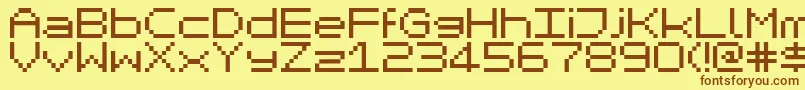 MikrokomputerClosed Font – Brown Fonts on Yellow Background