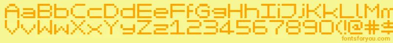 MikrokomputerClosed-fontti – oranssit fontit keltaisella taustalla
