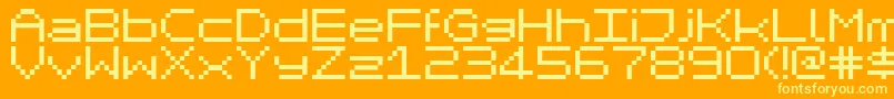 MikrokomputerClosed-fontti – keltaiset fontit oranssilla taustalla