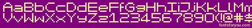 Fonte MikrokomputerClosed – fontes amarelas em um fundo roxo