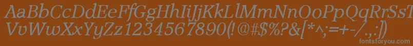 Подробнее о шрифте AccoladeItalic Шрифт AccoladeItalic – серые шрифты на коричневом фоне